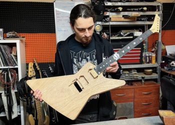беларус чинит гитары музыкантам в Польше